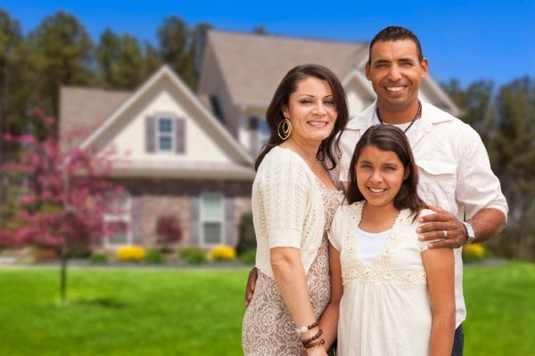 Family in Front of Home