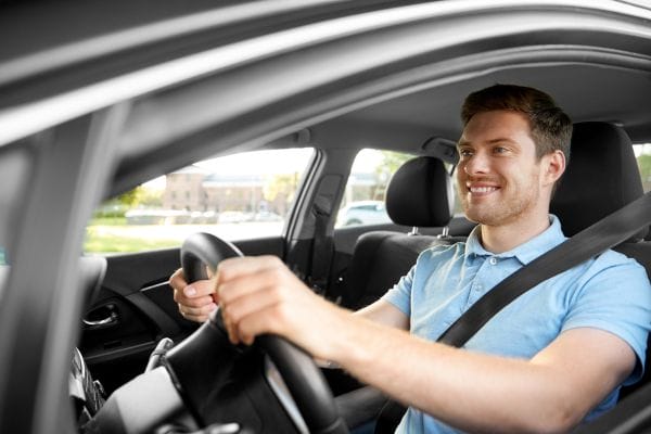 Man Driving a Car